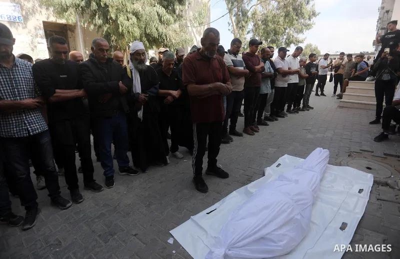 Mourners attend the funeral of Obaida Murtaja and Hatem Hassanein at al-Shifa Hospital in Gaza City, Gaza Strip, on October 17, 2026. The two men were killed in separate Israeli drone strikes. Photo by Mohammed Salha\ ap...