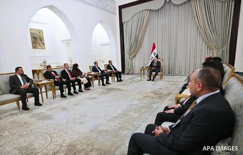 Iraqi President Nizar Amedi receives a delegation from the Badr parliamentary bloc, in the presence of members of the Patriotic Union of Kurdistan (PUK) parliamentary bloc, at the Peace Palace in Baghdad, Iraq, on Octobe...