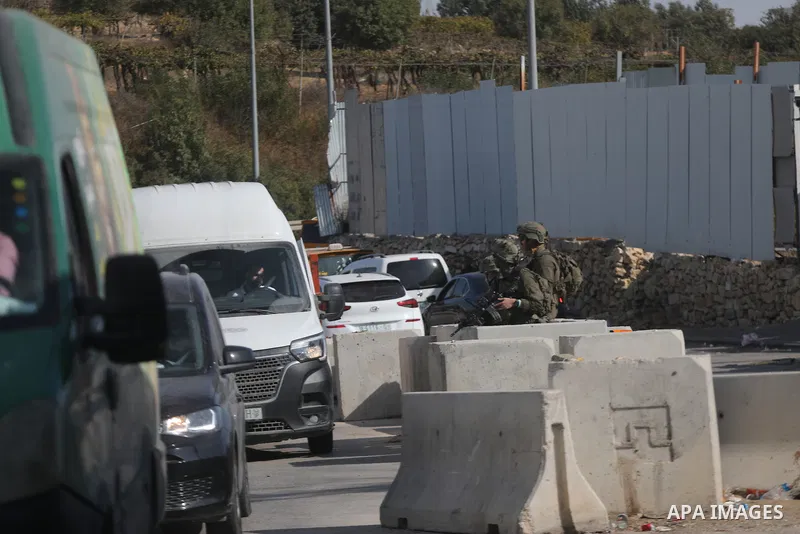 Israeli soldiers and military vehicles are deployed along streets in the West Bank city of Hebron, on October 26, 2026, as an Israeli military operation continues for the fourth consecutive day. The operation involves ro...