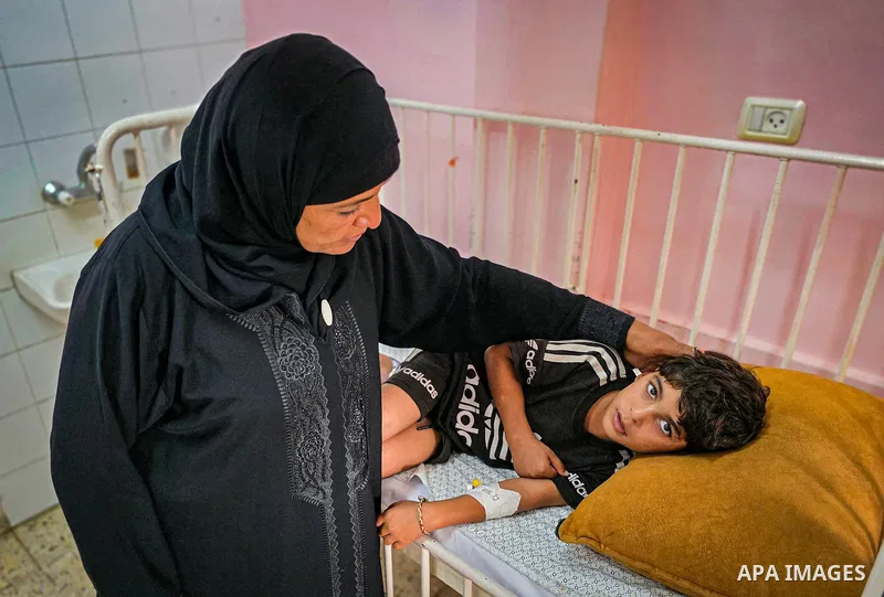 Palestinian children receive medical care at Nasser Medical Complex in Khan Younis, southern Gaza Strip, on October 27, 2026, amid reports of multiple cases of bacterial meningitis accompanied by bloodstream infections a...