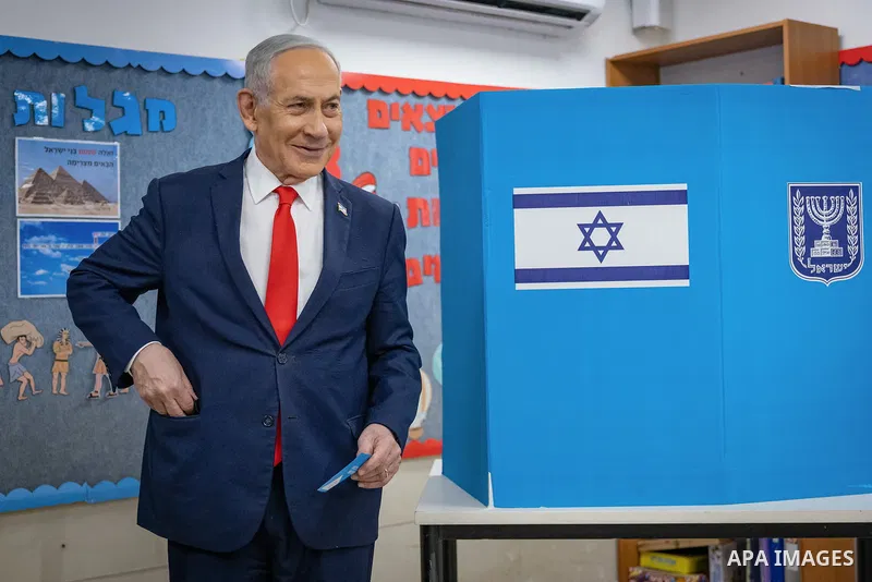 27 October 2026, ---, Jerusalem: Israeli Prime Minister and leader of the Likud party Benjamin Netanyahu, reacts after filling out his ballot at a polling station in Jerusalem during Israel's legislative election. (Credi...