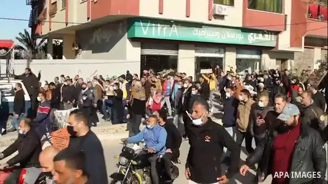 Palestinian employees of the security services -2005, take part in a march to demand an end to the issue of 2005 legally, in front of the headquarters of the Central Committee of Fatah Footage by Mahmoud Ajjour/APAwire