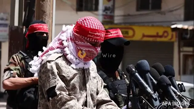 APAwire - APAwire CLIENTS ONLY, Gaza - 08 May Palestinian militant of the National Resistance brigades, the armed wing of the Democratic Front for the Liberation of Palestine (DFLP), Abu Khaled, speaks during a press con...