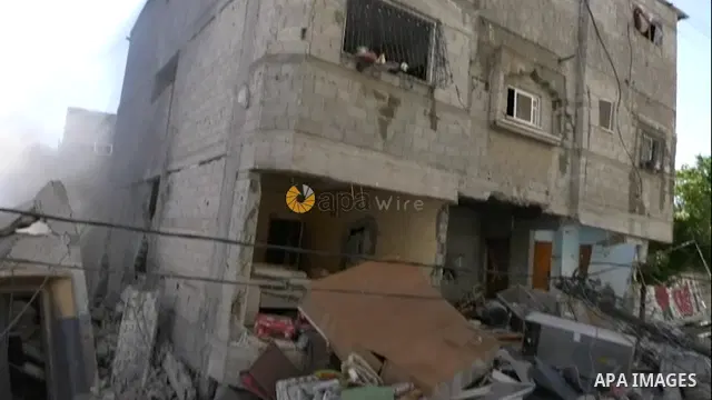 An Israeli air strike destroyed a building in Gaza City, as Israel continued its heavy bombardment of the Palestinian enclave. STORYLINE A new round of Israeli-Palestinian fighting, set off by tensions over the holy city...