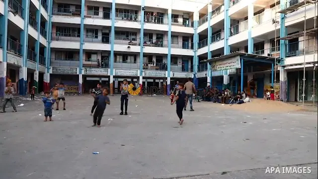 Palestinian families take shelter in a UN school in Gaza City after fleeing from their homes in the town of Beit Lahia. STORYLINE The deadly exchange of fire between Palestinian militants in the Gaza Strip and the Israel...