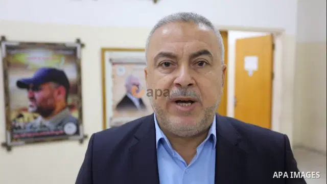 Senior Hamas leader Ismail Radwan speaks during an interview with APA