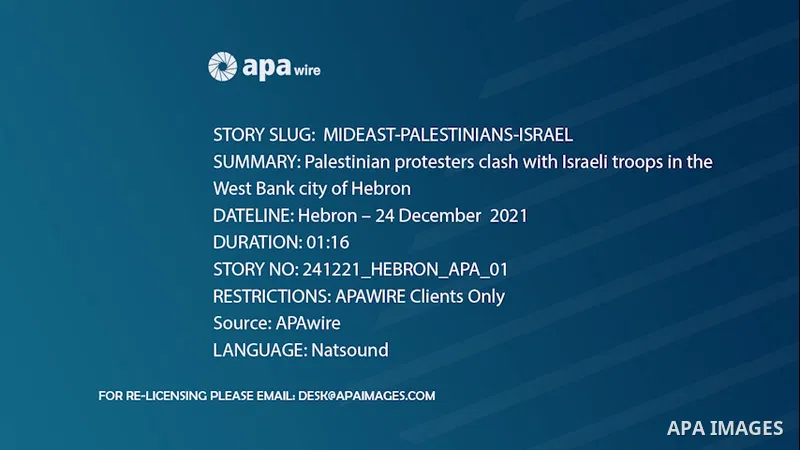 Palestinian protesters clash with Israeli troops in the West Bank city of Hebron. Footage by / APAwire