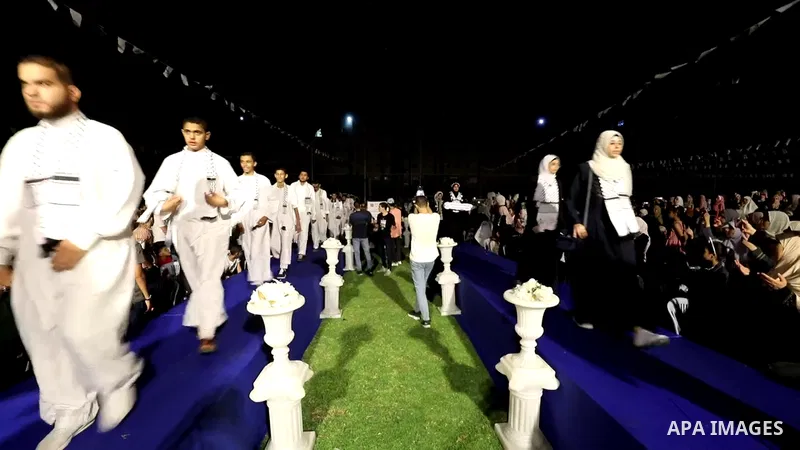 People attend a honor ceremony of 581 Palestinians who recited from memory the entire Koran, Islam's holy book, in an event last week in one sitting, in Gaza City. Footage by /APA
