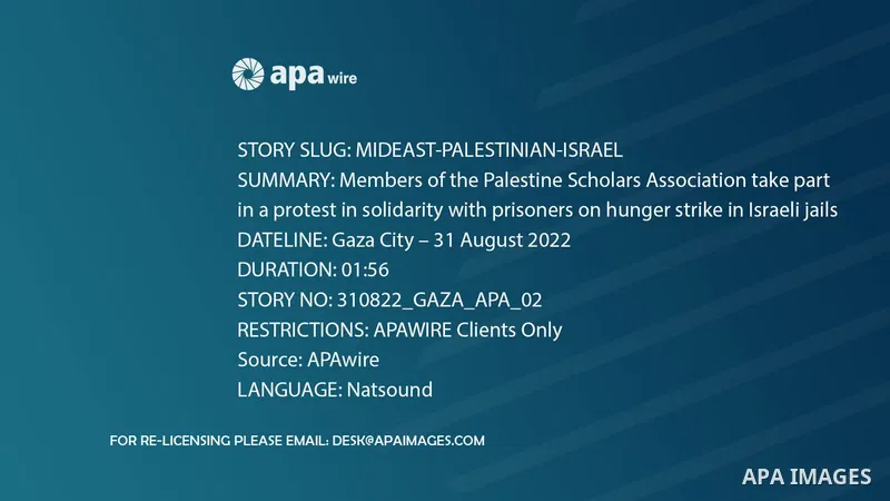 Members of the Palestine Scholars Association take part in a protest in solidarity with prisoners on hunger strike in Israeli jails, in Gaza city
