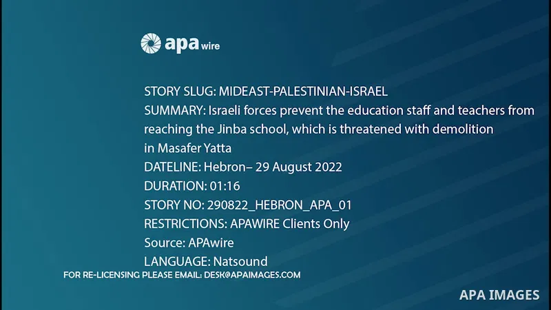 Israeli forces prevent the education staff and teachers from reaching the Jinba school, which is threatened with demolition in Masafer Yatta, in the West Bank city of Hebron, on the first day of school after the summer h...