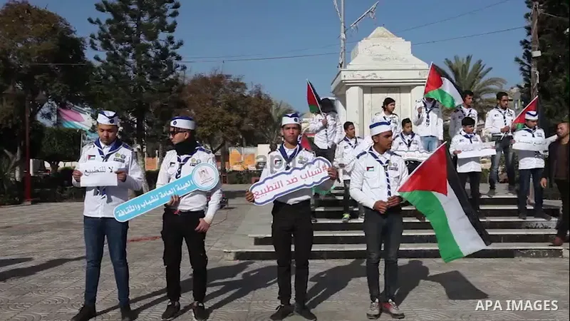Palestinians take part in a protest against normalization 0.1