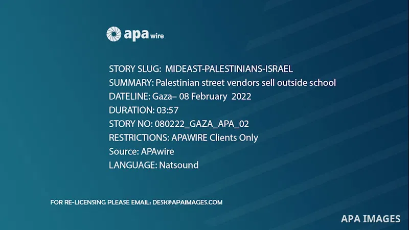 Palestinian street vendors sell food outside school, while students leave their school.