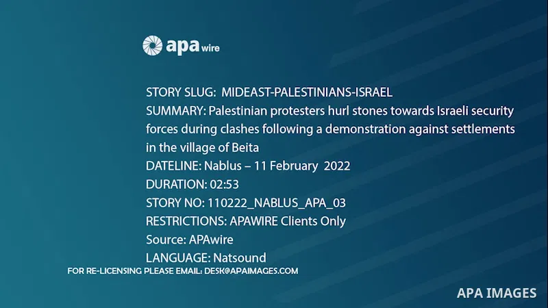 Palestinian protesters hurl stones towards Israeli security forces during clashes following a demonstration against settlements in the village of Beita, near the West Bank city of Nablus. 0.1