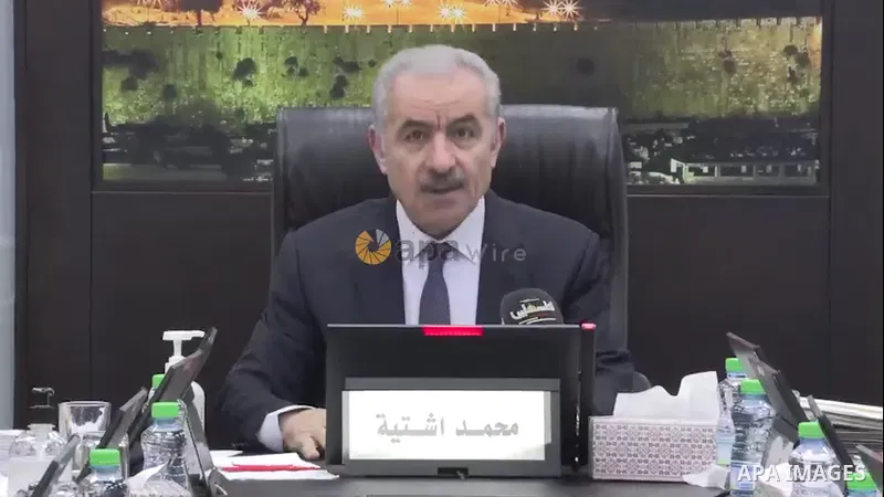 Palestinian Prime Minister Mohammed Ishtayeh chairs the weekly meeting of his government, in the West Bank city of Ramallah Footage by /APA