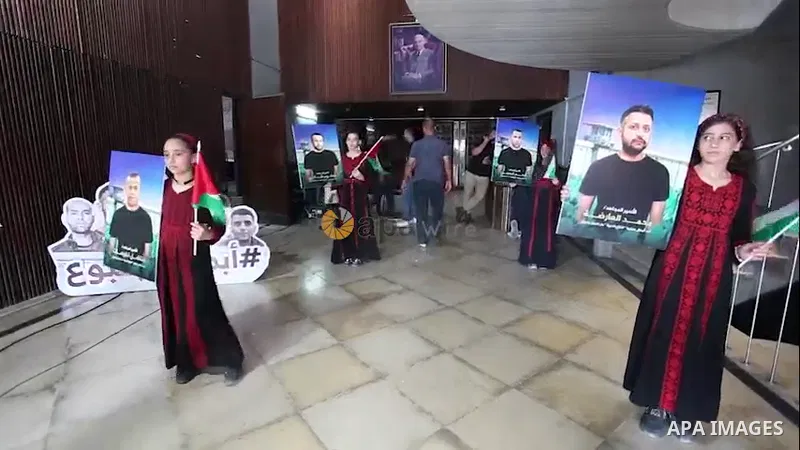Palestinians take part in an event marking the first anniversary of six Palestinian prisoners escaped from Israeli Gilboa Prison, in Gaza city. 0.1