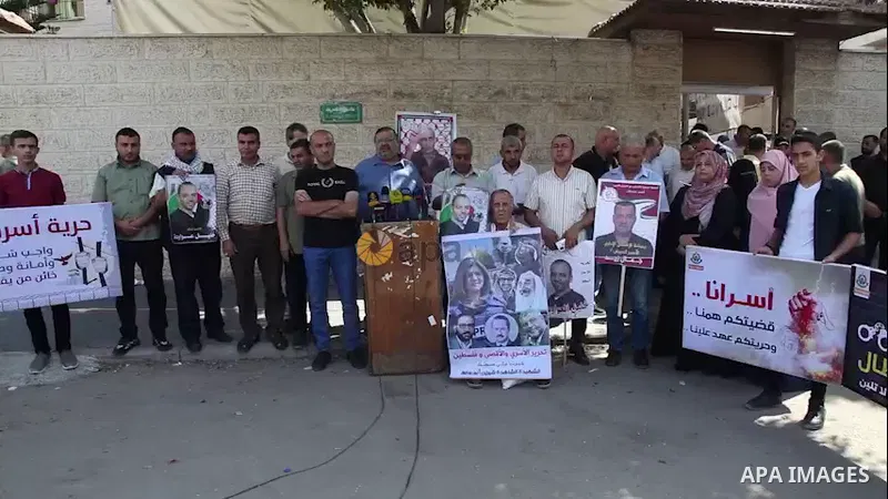 Palestinians take part in a protest in solidarity with Khalil Awawdeh, 40, has been on hunger strike in front of the headquarters of the Red Cross in Gaza City. 0.1