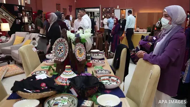 Palestinians participate in a bazaar for products and handicrafts produced by people with hearing disabilities for the first time in nearly two and a half years due to the Corona pandemic, in Gaza city. 0.1