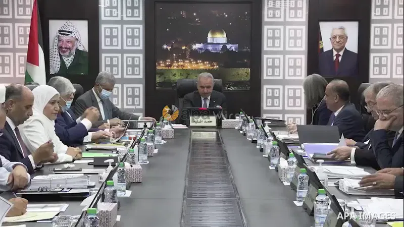 Palestinian Prime Minister Mohammed Ishtayeh chairs the weekly meeting of his government, in the West Bank city of Ramallah. Footage by /APA