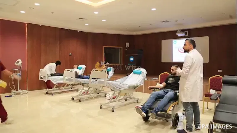 Palestinians donate blood during the campaign "Every drop of blood saves a hospitalized patient", in the West Ban city of Jenin. 0.1