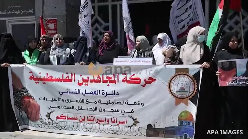 Palestinian supporters of the Mujahideen Movement take part in a protest in solidarity with prisoners in Israeli Jails, in Gaza city. 0.1