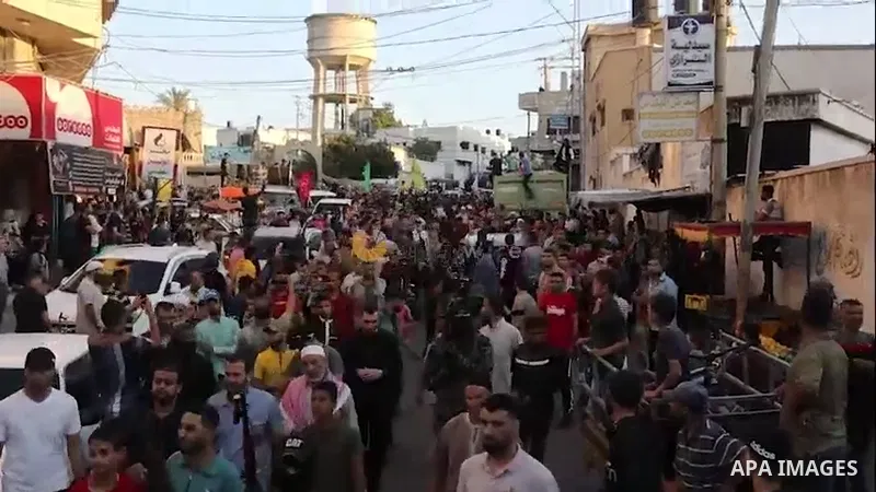 Relatives of commander at Palestinian Islamic Jihad movement Yasser Al-Masry who died of his wounds during the last conflict on May 2021 between Isarel and Hamas attend his funeral, in Deir al-Balah in the center of Gaza...