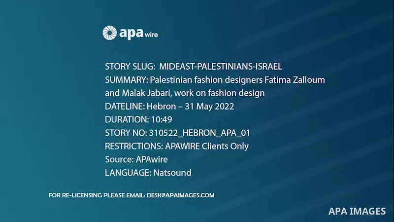 Palestinian fashion designers Fatima Zalloum and Malak Jabari, work on fashion design at a home, in the West Bank city of Hebron. 0.1