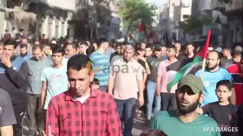 Palestinians take part in a protest to express their solidarity with Jerusalem, in Jabalia in the northern of Gaza strip.