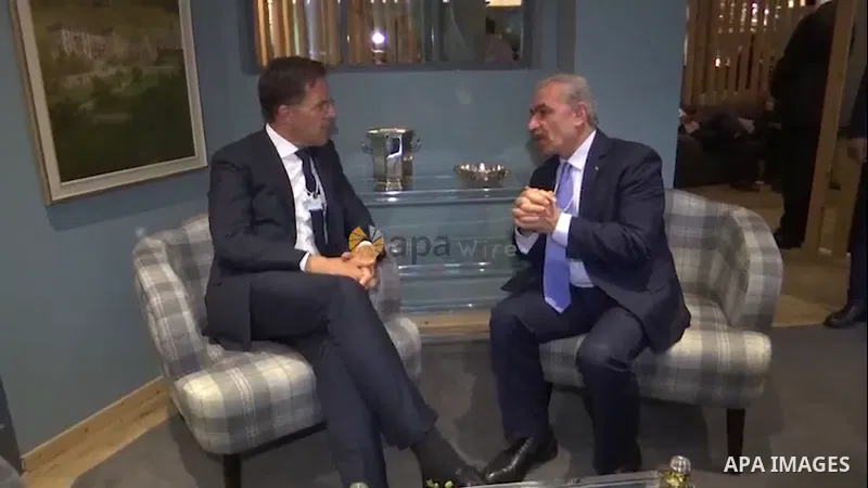 Palestinian Prime Minister Mohammed Ishtayeh meets with Dutch Prime Minister Mark Rutte, in Davos, Switzerland. Footage by APAwire