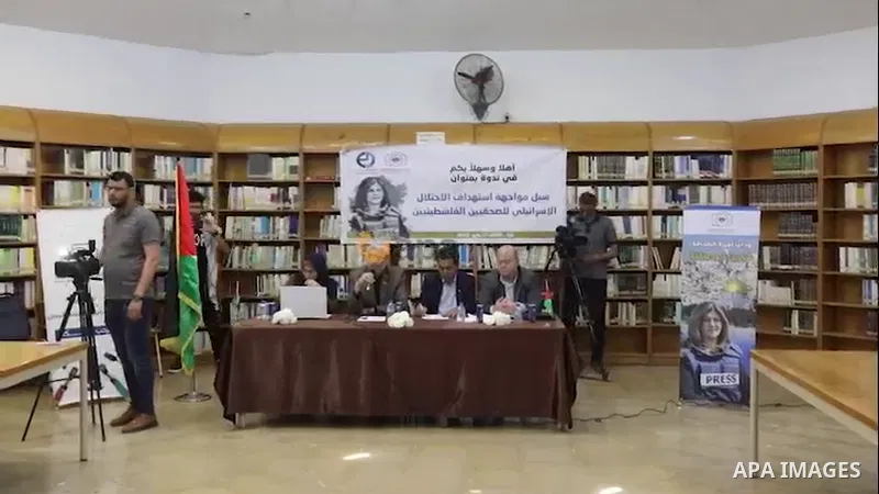 Palestinians take part in a meeting to condemn the killing of slain Al Jazeera journalist Shireen Abu Akleh in Gaza city. 0.1
