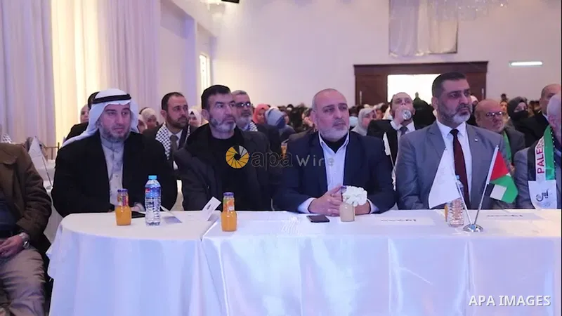 Palestinians attend the ceremony marking the eighteenth anniversary of the death of late Hamas leader Sheikh Ahmed Yassin, who was killed in an Israeli attack. 0.1