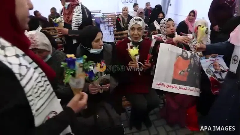 APAwire - APAwire CLIENTS ONLY, Gaza- 21 March. Palestinians take part in a protest in solidarity with prisoners in Israeli jails, on the mother's Day in front of Red Cross office. 0.1