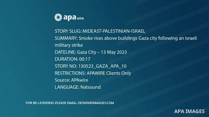Smoke rises above buildings Gaza city following an Israeli military strike.
