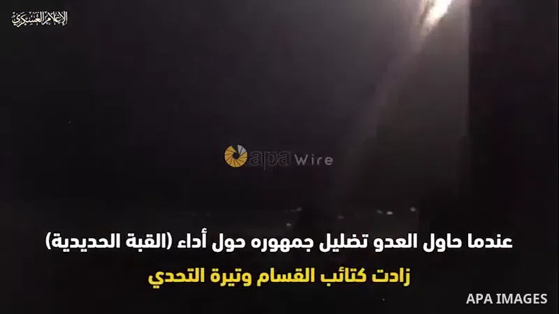 A handout video released by Al-Qassam Brigades, the military wing of the Palestinian movement Hamas shows the group militant fire rockets towards Tel Aviv during the 2014 conflict with Israel.