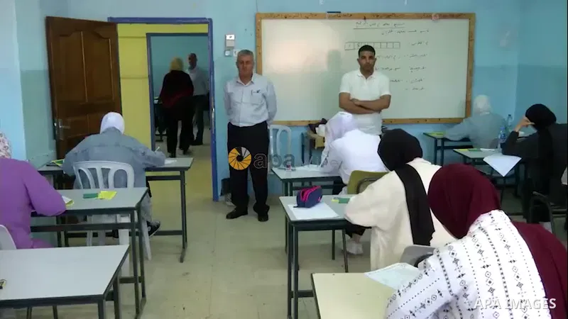 Palestinian students sit for their final high school exams, known as "Tawjihi", in the West Bank city of Ramallah.