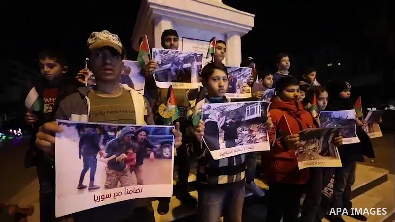 Palestinian children attend a gathering in solidarity with the people of Turkey and Syria following a devastating earthquake, in Gaza city.