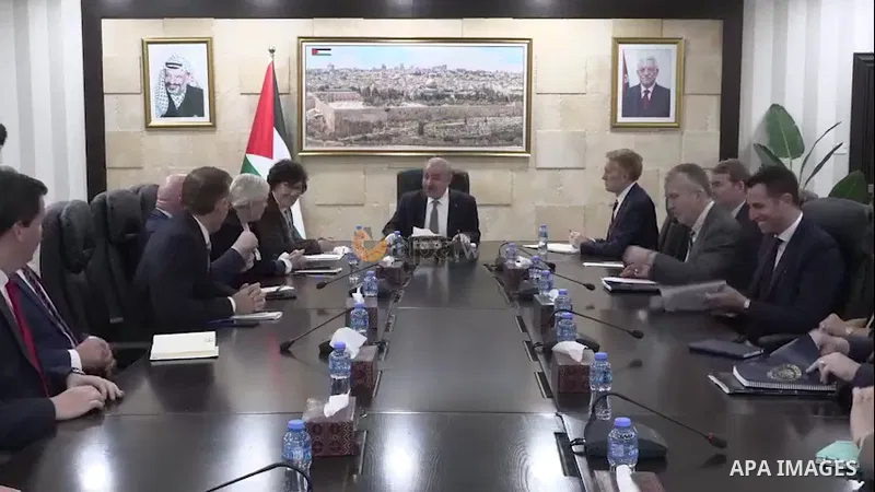 Palestinian Prime Minister Mohammad Shtayyeh meets with a delegation from the US Senate, in the West Bank city of Ramallah. Footage by APAwire