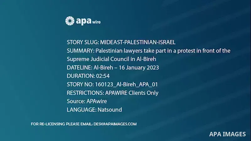Palestinian lawyers take part in a protest in front of the Supreme Judicial Council in Al-Bireh, in the West Bank city. 0.1