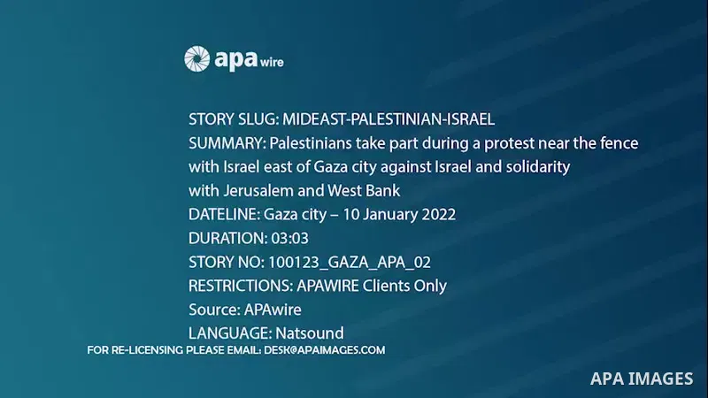Palestinians take part during a protest near the fence with Israel east of Gaza city against Israel and solidarity with Jerusalem and West Bank Footage by /APA