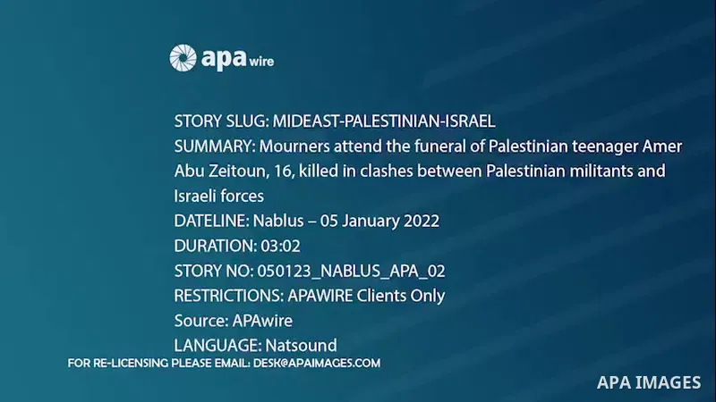 Mourners attend the funeral of Palestinian teenager Amer Abu Zeitoun, 16, killed in clashes between Palestinian militants and Israeli forces during an overnight raid on the Balata refugee camp in the town of Nablus. 0.1