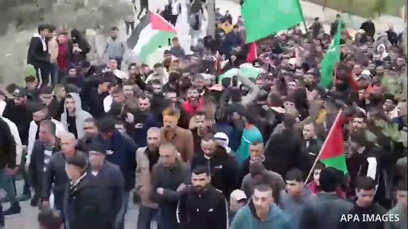 Mourners carry the body of Palestinian Mohammad Abed who was killed by Israeli force during his funeral procession in the West Bank city of Jenin.