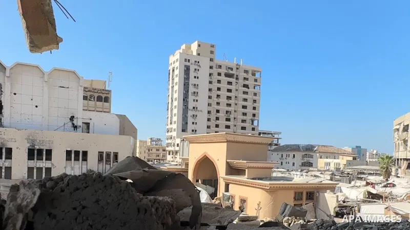 Restrictions Summary: APA wire clients only Shortlist: APAwire - APA wire clients only, Gaza City- September 8, 2025. Smoke and flames rise as a residential building collapses after an Israeli air strike, in Gaza City, S...