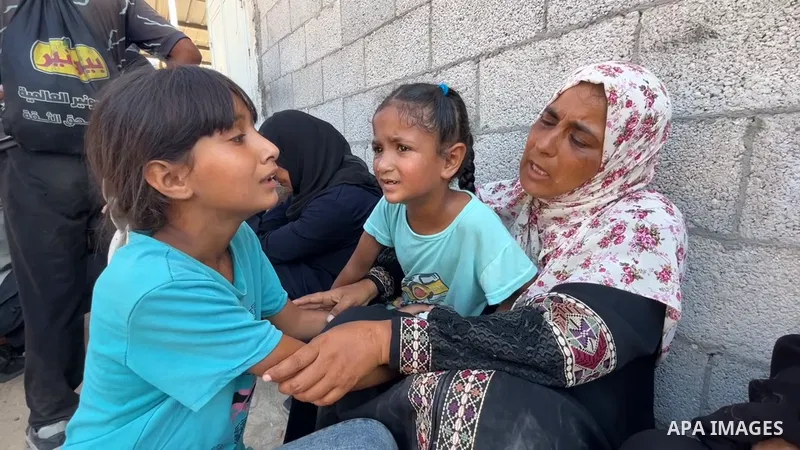 Restrictions Summary: APA wire clients only Shortlist: APAwire - APA wire clients only, Khan Yunis- July 24, 2025. People mourn their loss as bodies of Palestinians killed in Israeli attack on makeshift tents are brought...