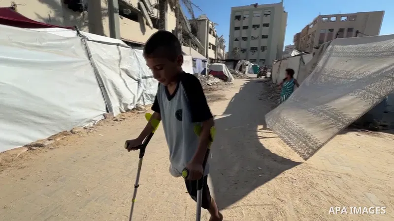 Restrictions Summary: APA wire clients only Shortlist: APAwire - APA wire clients only, Gaza- July 9, 2025. 10-year-old Muhammed Omar Selim Muslih, who followed his father to get aid for their family in the Netzarim Corr...