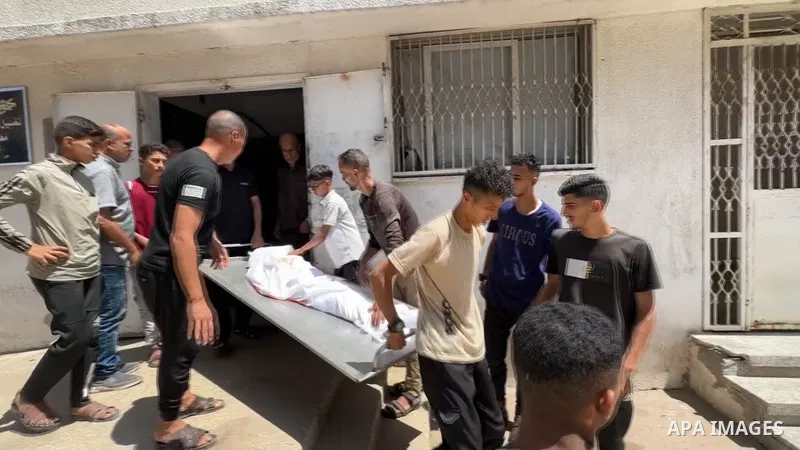 Restrictions Summary: APA wire clients only Shortlist: APAwire - APA wire clients only, Gaza- July 8, 2025. Relatives of the Palestinians who lost their lives, including children, mourn during the funeral ceremony held a...