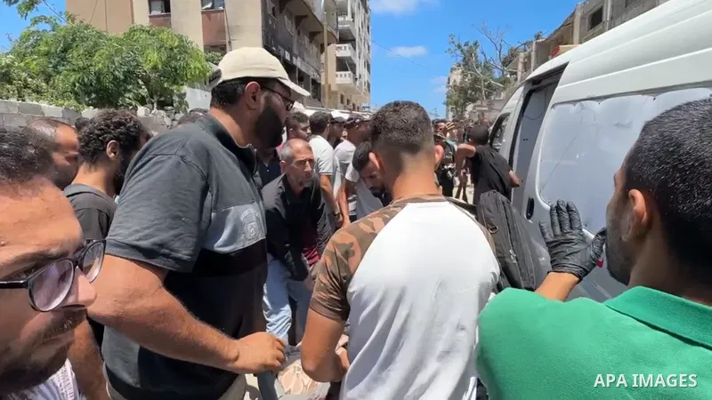 Restrictions Summary: APA wire clients only Shortlist: APAwire - APA wire clients only, Gaza City- July 8, 2025. The injured and bodies of the victims of the Israeli attack on the tent of the displaced family are taken f...