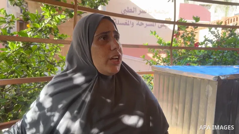 Restrictions Summary: APA wire clients only Shortlist: APAwire - APA wire clients only, Khan Yunis- July 8, 2025. Relatives of Palestinians killed in an Israeli airstrike mourn at the morgue of Nasser Hospital in Khan Yu...