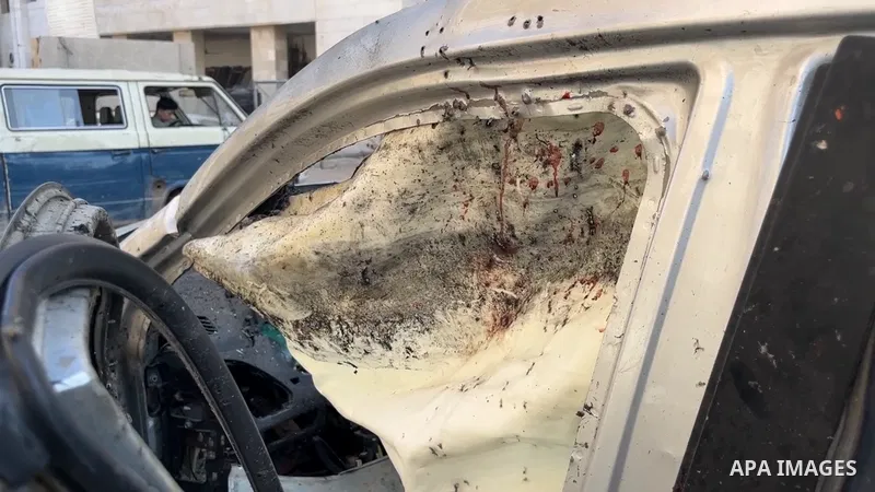 Restrictions Summary: APA wire clients only Shortlist: APAwire - APA wire clients only, Gaza- July 8, 2025. Palestinians inspect a car hit in an Israeli strike on Monday, in Gaza City, July 8, 2025.