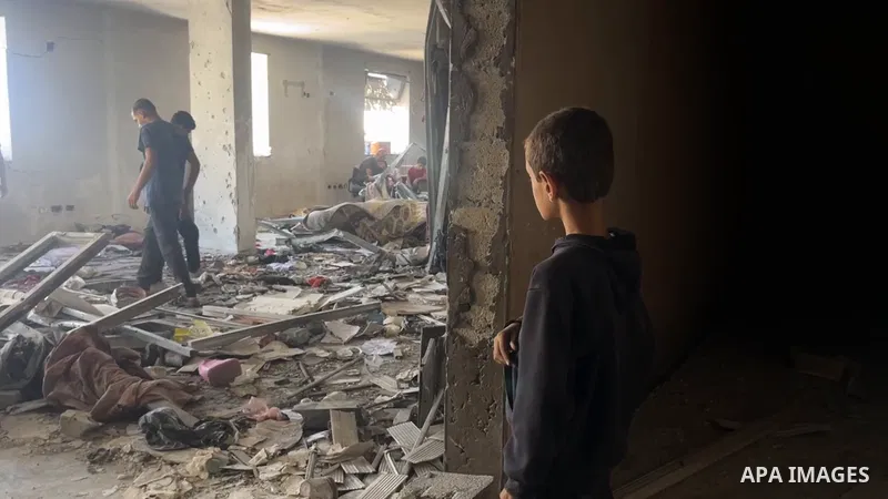 Restrictions Summary: APA wire clients only Shortlist: APAwire - APA wire clients only, Gaza- July 7, 2025. A view of damage at Rimal Clinic building housing displaced persons following the Israeli attacks in Gaza City,...