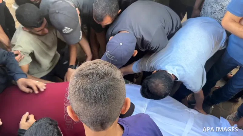 Restrictions Summary: APA wire clients only Shortlist: APAwire - APA wire clients only, Gaza- July 7, 2025. Relatives of Palestinians, who lost their loved ones following an Israeli airstrike on the Rimal Clinic building...