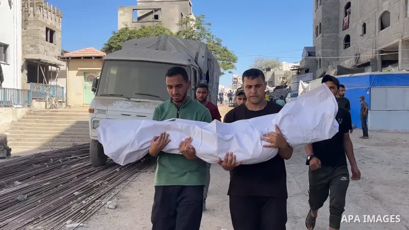 Restrictions Summary: APA wire clients only Shortlist: APAwire - APA wire clients only, Gaza- July 6, 2025. Relatives of Palestinians, who lost their loved ones following an Israeli airstrike on Abu Asi School housing di...